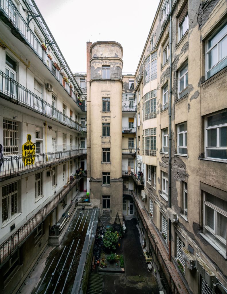 The old courtyard of József Attila utca 18 provides a peaceful escape from the city's hustle and bustle.