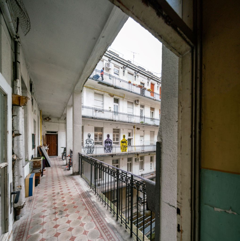 The old courtyard of József Attila utca 18 provides a peaceful escape from the city's hustle and bustle.