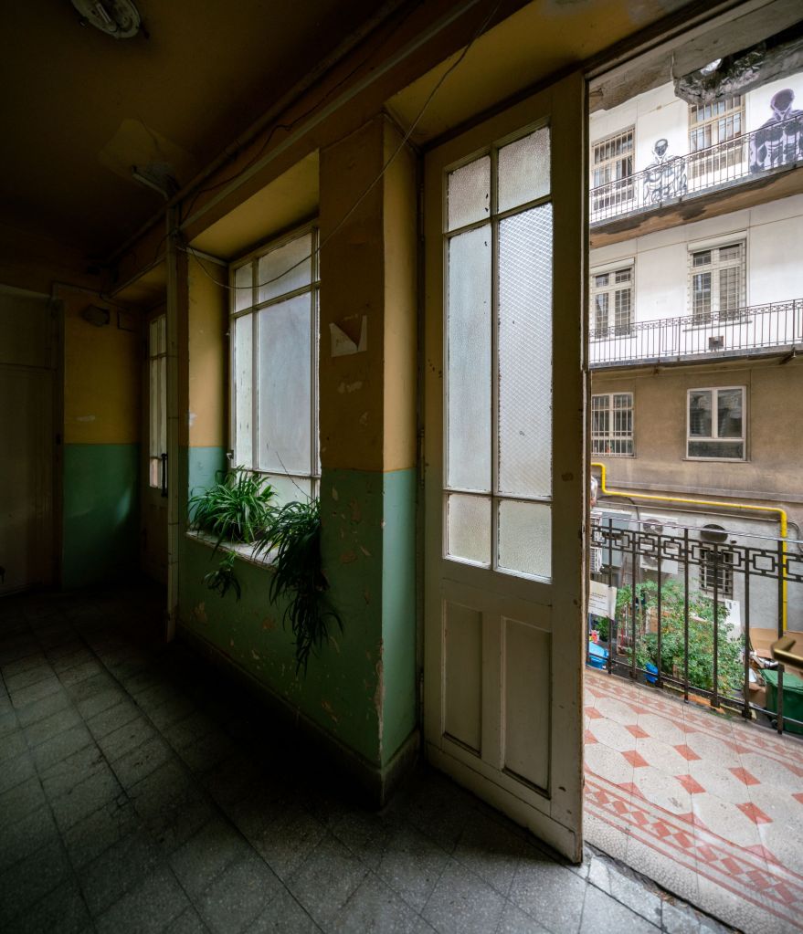 The old courtyard of József Attila utca 18 provides a peaceful escape from the city's hustle and bustle.