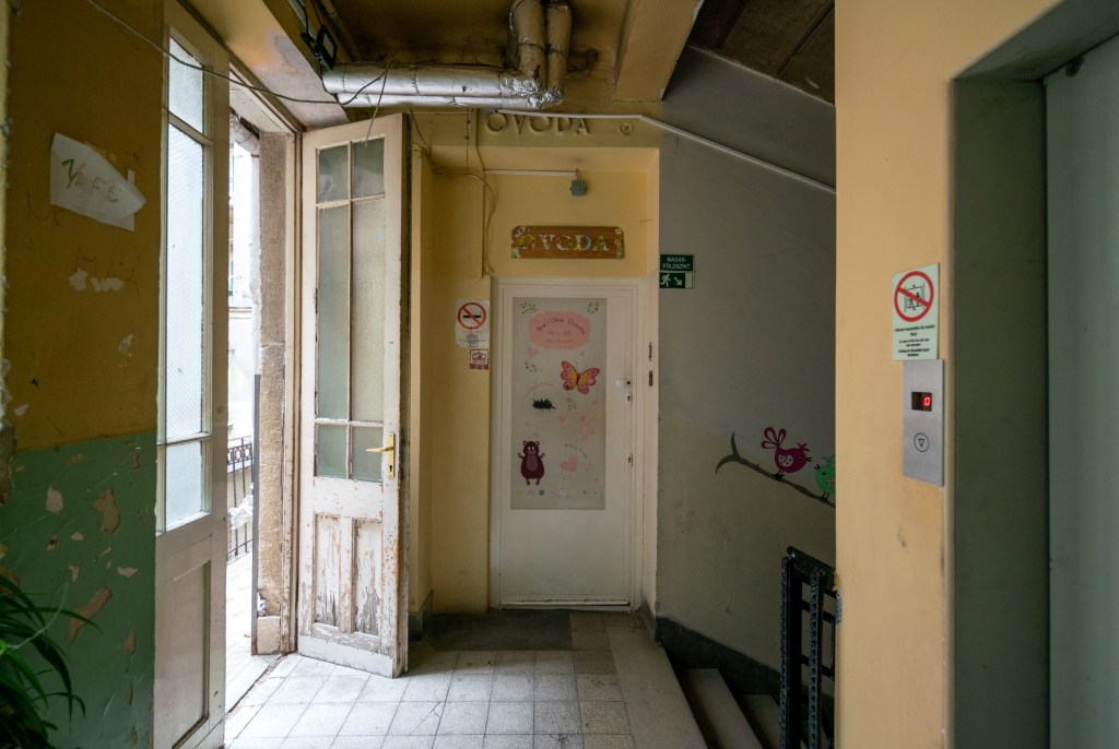 The doorway to the kindergarten located on the first floor of József Attila utca 18, where young minds embark on their educational journey.