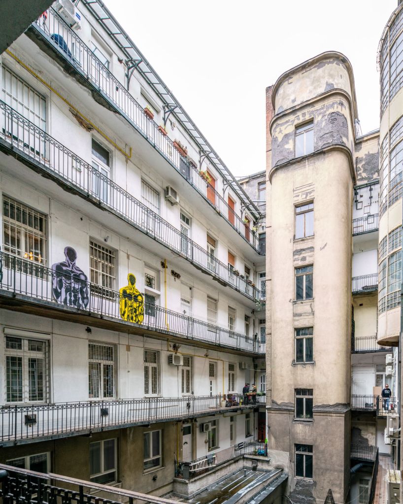 The old courtyard of József Attila utca 18 provides a peaceful escape from the city's hustle and bustle.