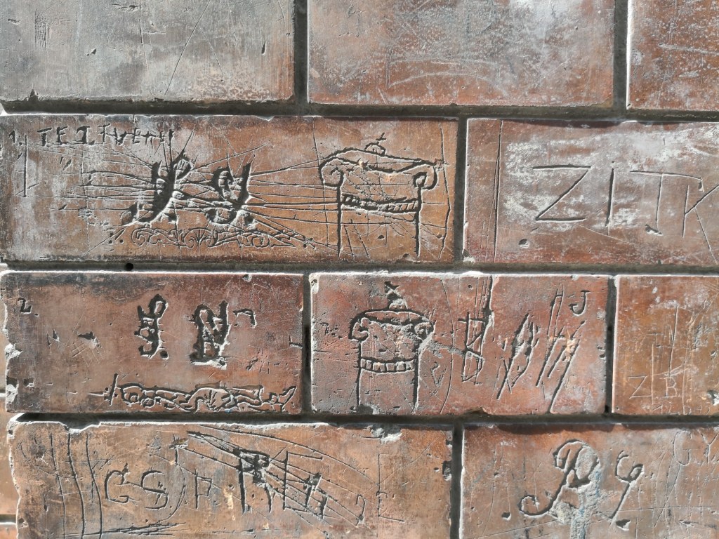 Old graffiti on a wall of Homok utca