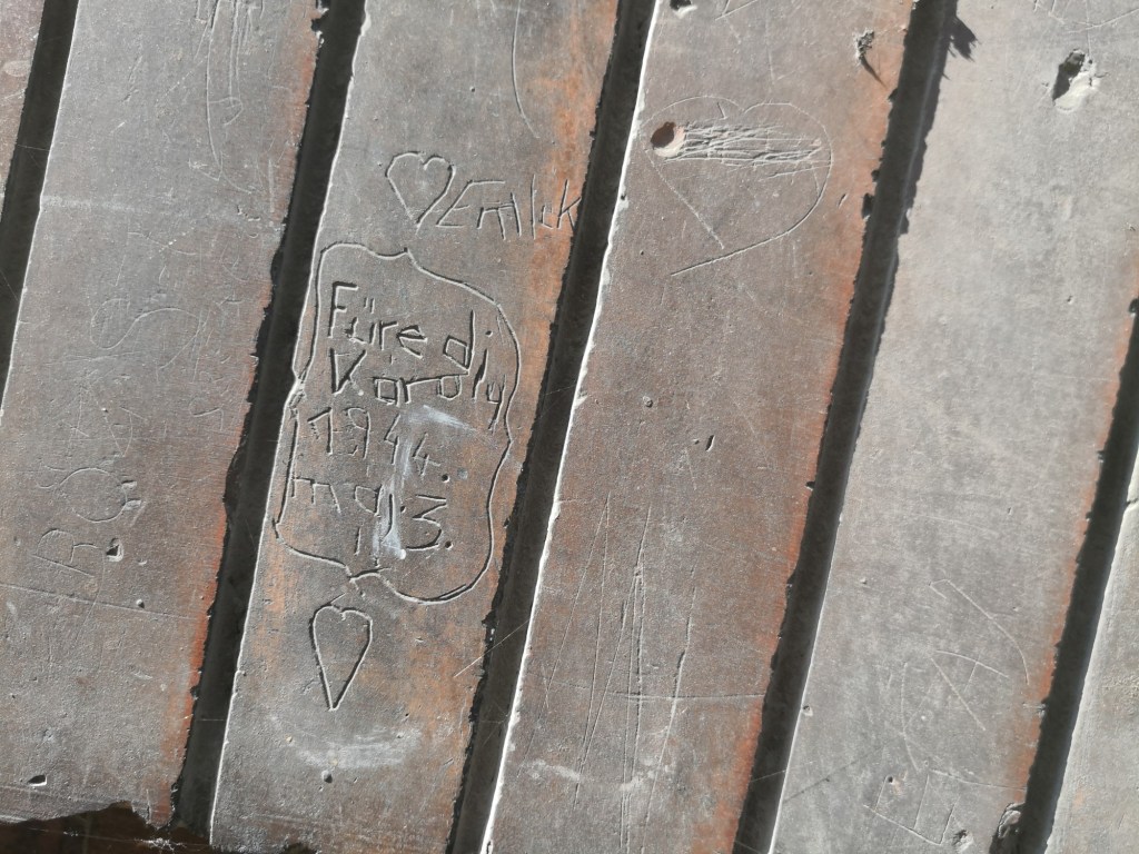 Historical graffiti on a wall of Homok utca