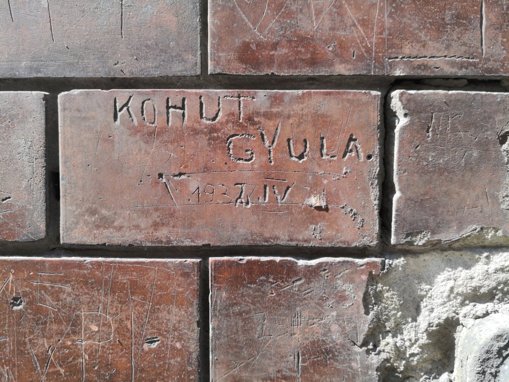 Historical graffiti on a wall of Homok utca