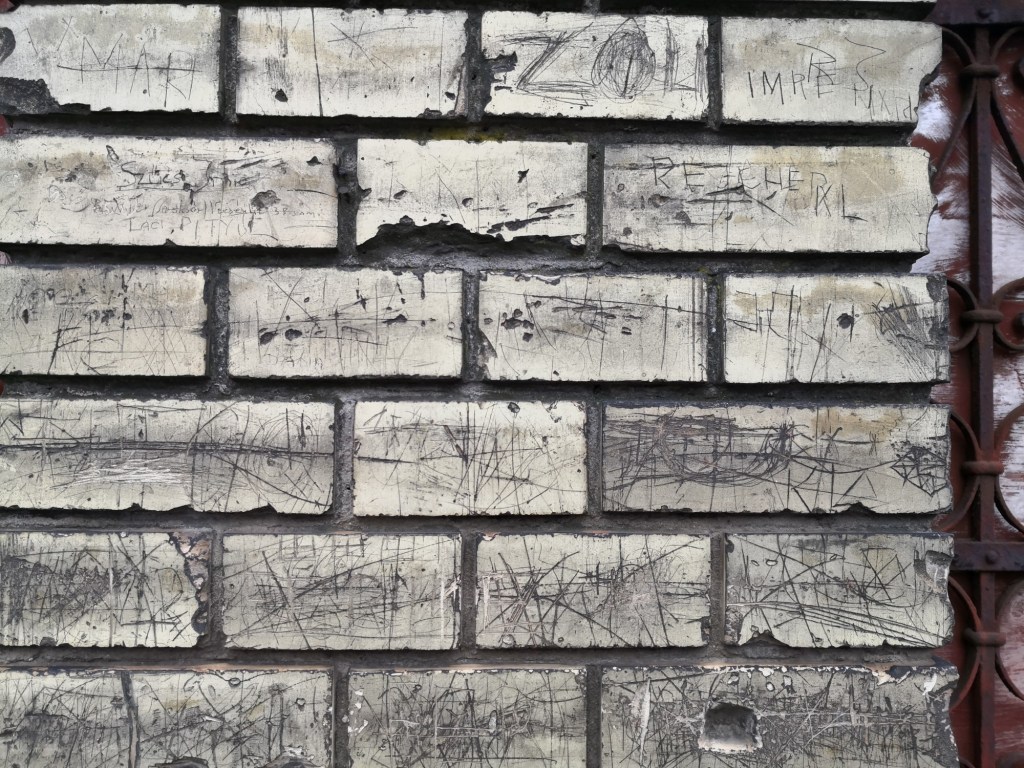 Old brick wall and graffiti in Budapest