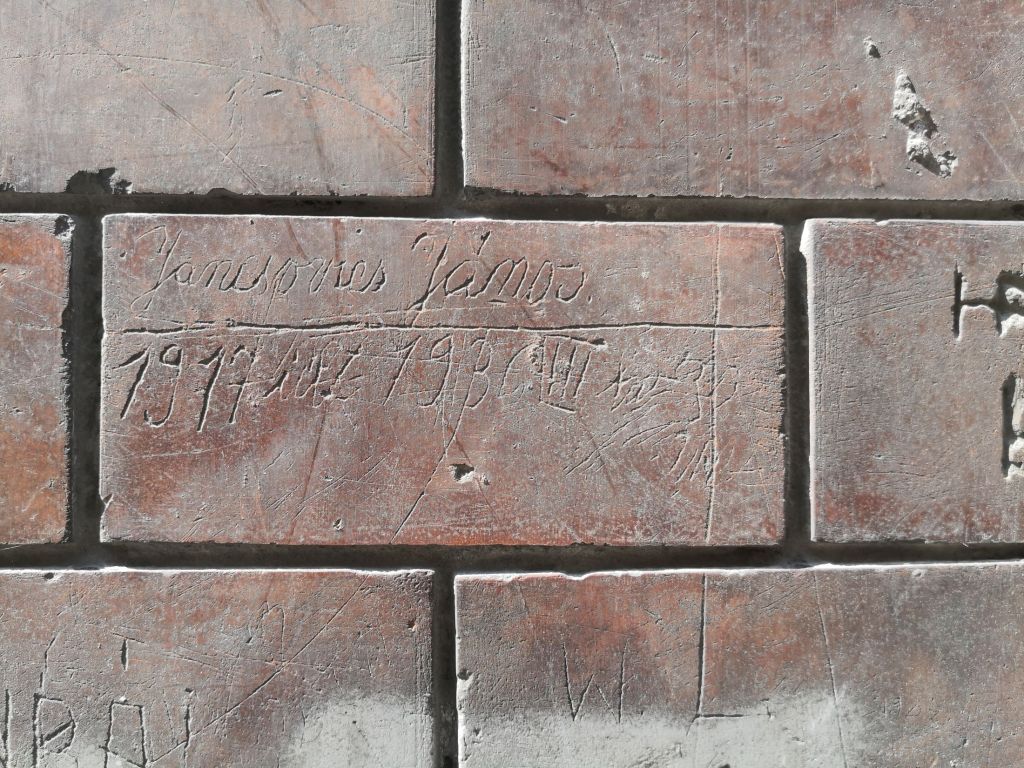 Historical graffiti on a wall of Homok utca