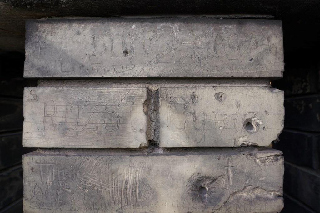 Old brick wall and graffiti on Váralja utca, Budapest