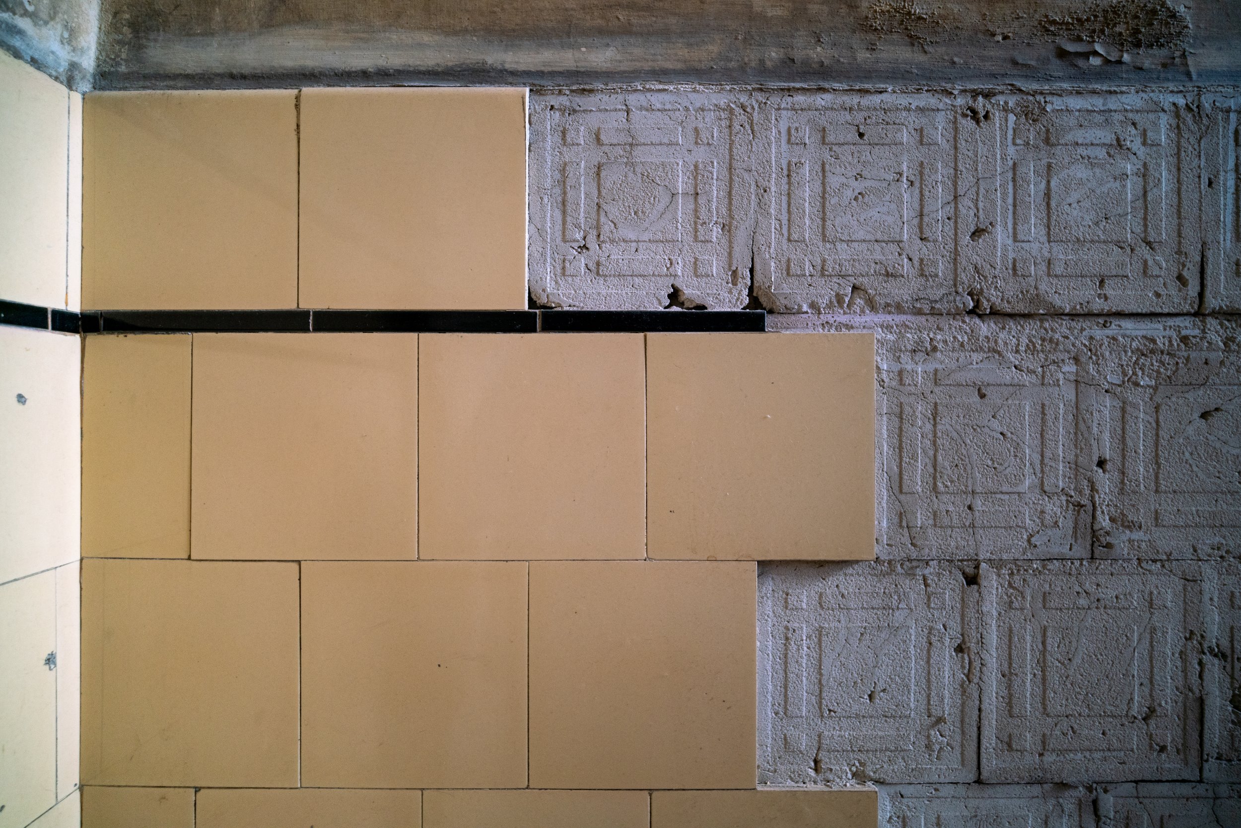 Old tiles in a 19th-century decaying old house in the center of Budapest.