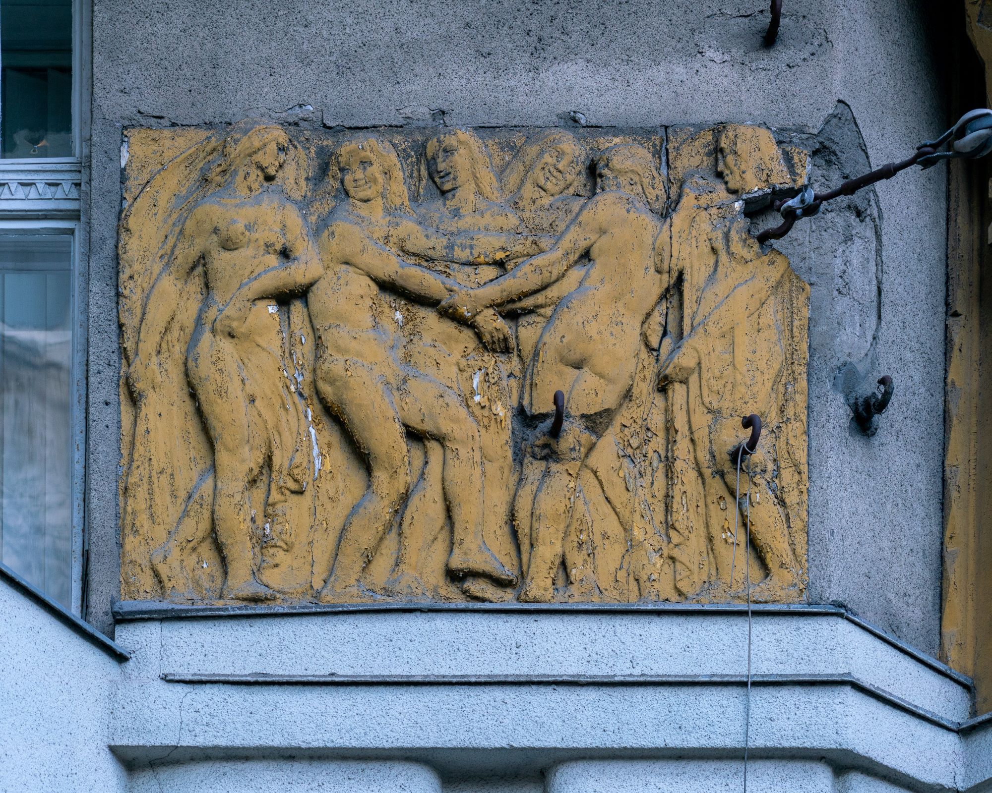 Relief the facade of an old house located at Dózsa György út 17, in Budapest