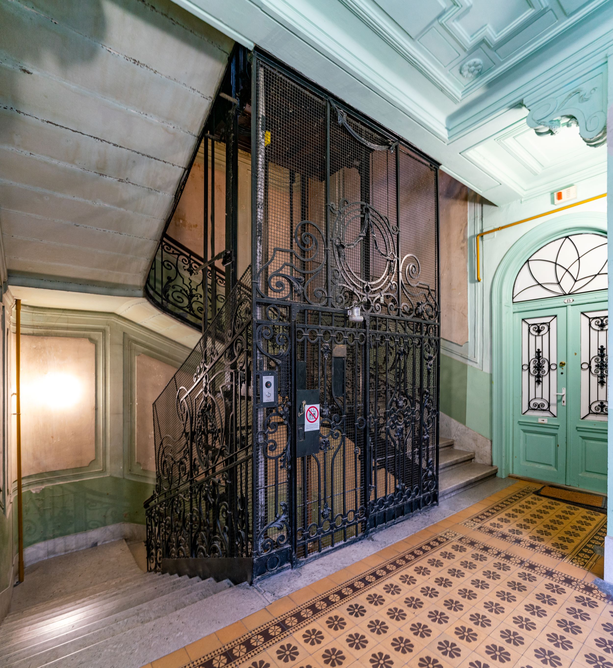The staircase of Semmelweis utca 4 with the historical elevator