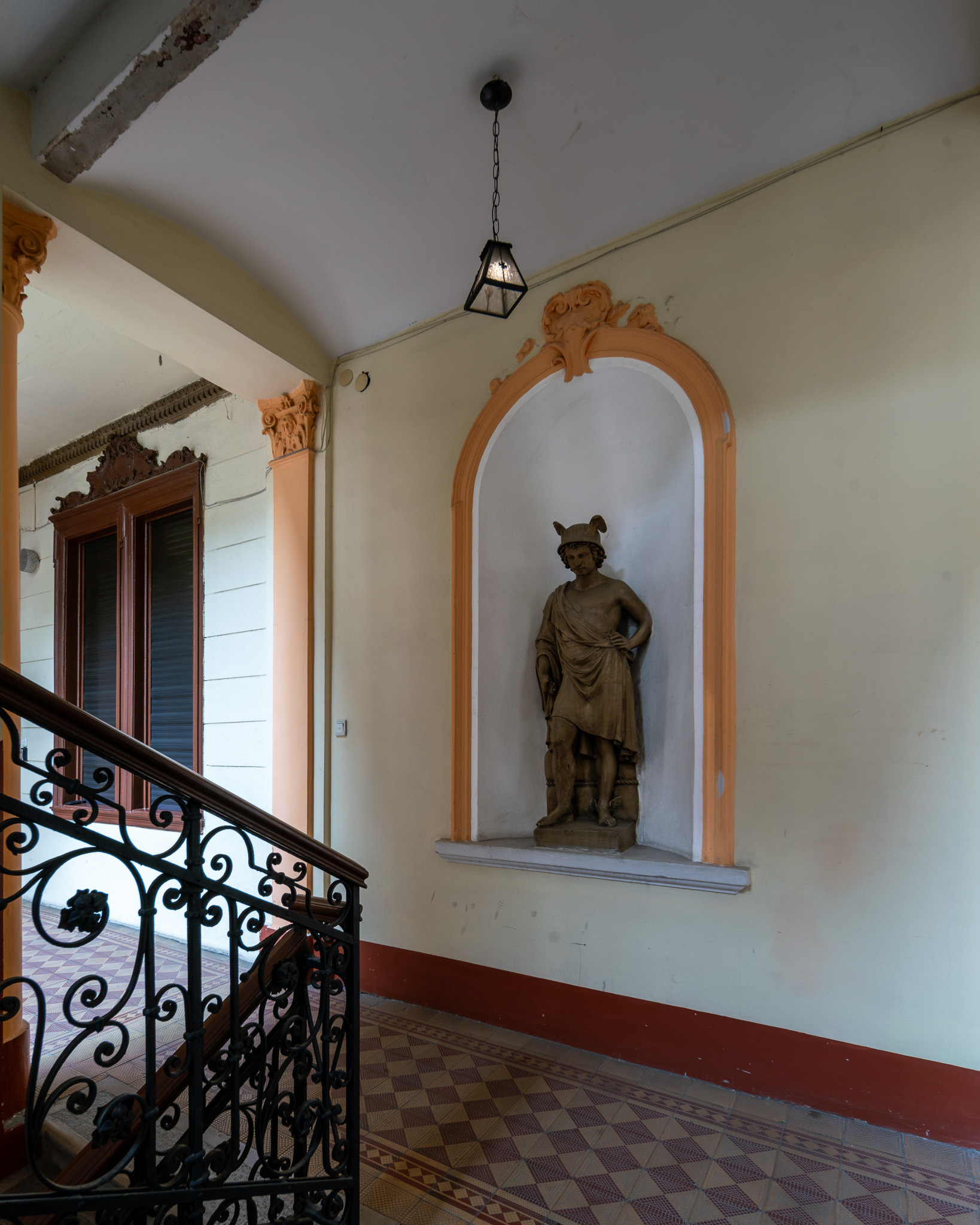 Statue in the staircase of Visegrádi utca 4, an old building in the 13th district of Budapest