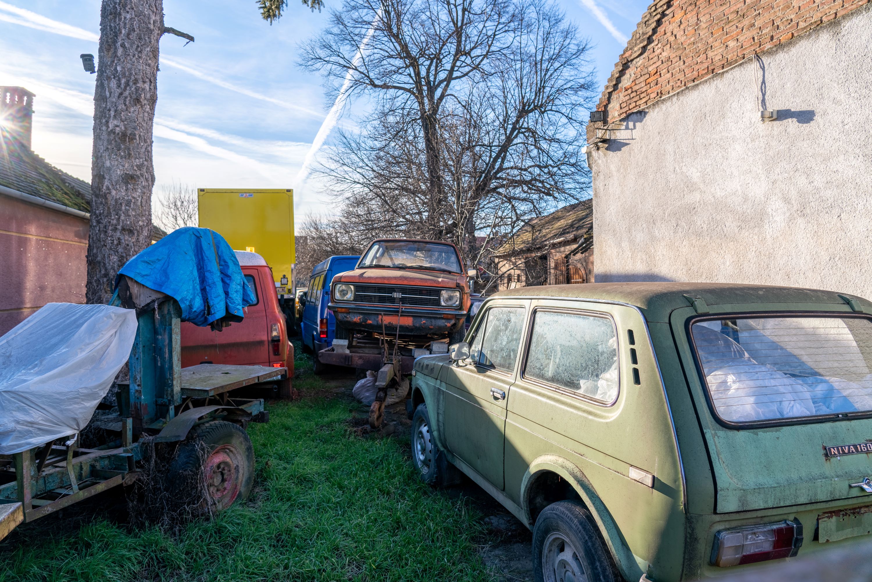 Courtyard with old cars in Sásd, Hungary
