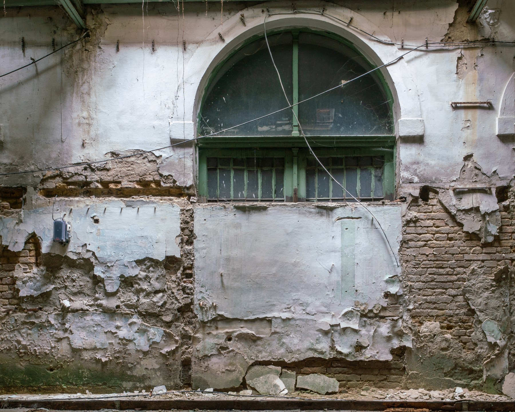 The abandoned courtyard of Paulay Ede utca 25-27 in Budapest. This residential building from 1890 is known as the "Üveg-Udvar" - "Glass Courtyard".