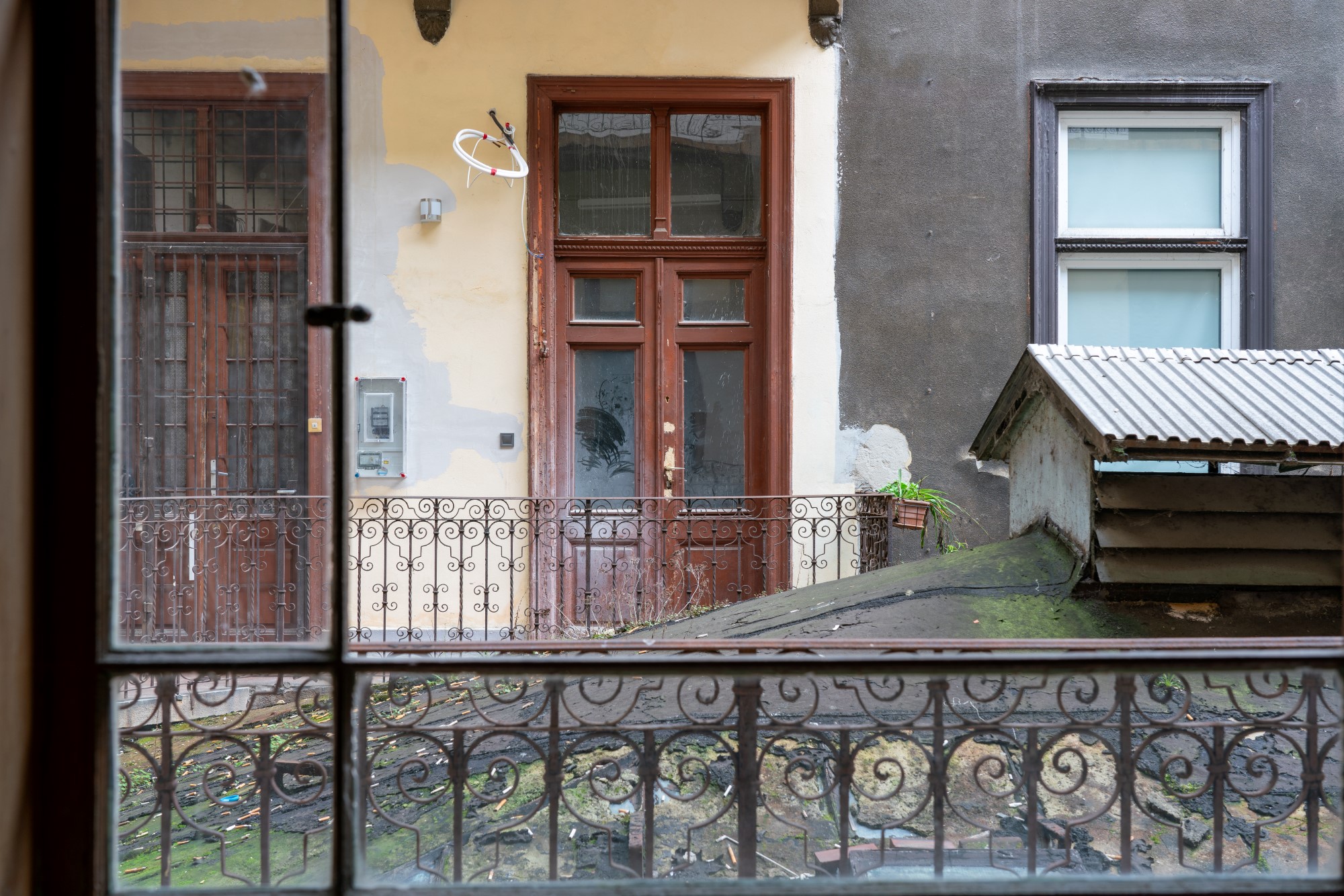 The abandoned courtyard of Paulay Ede utca 25-27 in Budapest. This residential building from 1890 is known as the "Üveg-Udvar" - "Glass Courtyard".