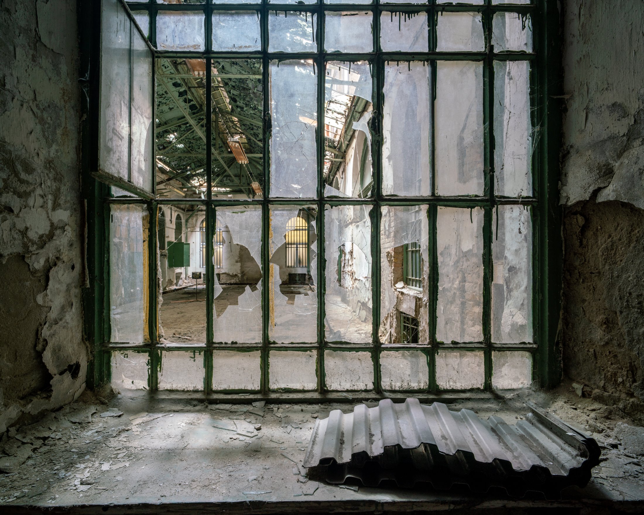 The abandoned courtyard of Paulay Ede utca 25-27 in Budapest. This residential building from 1890 is known as the "Üveg-Udvar" - "Glass Courtyard".
