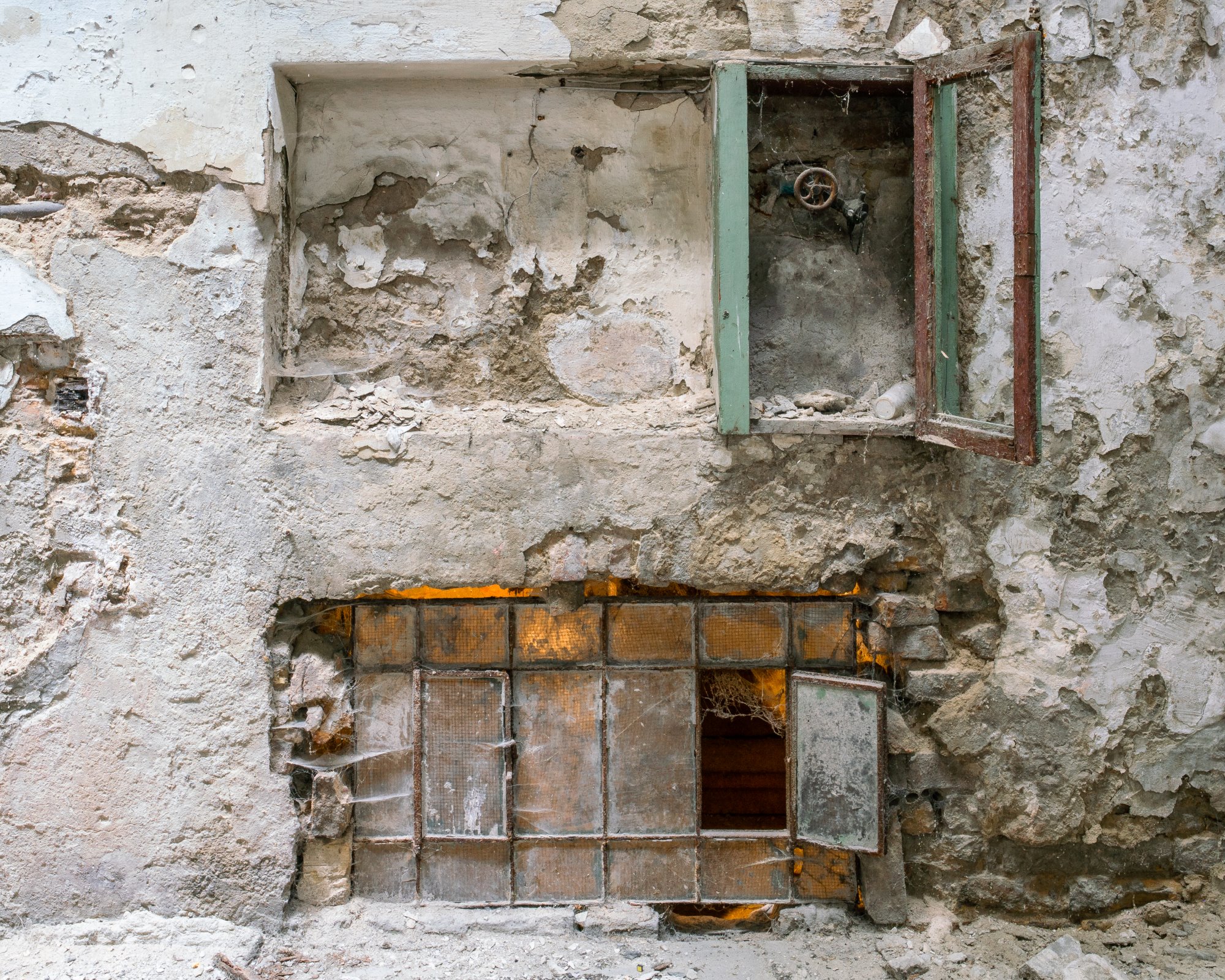 The abandoned courtyard of Paulay Ede utca 25-27 in Budapest. This residential building from 1890 is known as the "Üveg-Udvar" - "Glass Courtyard".