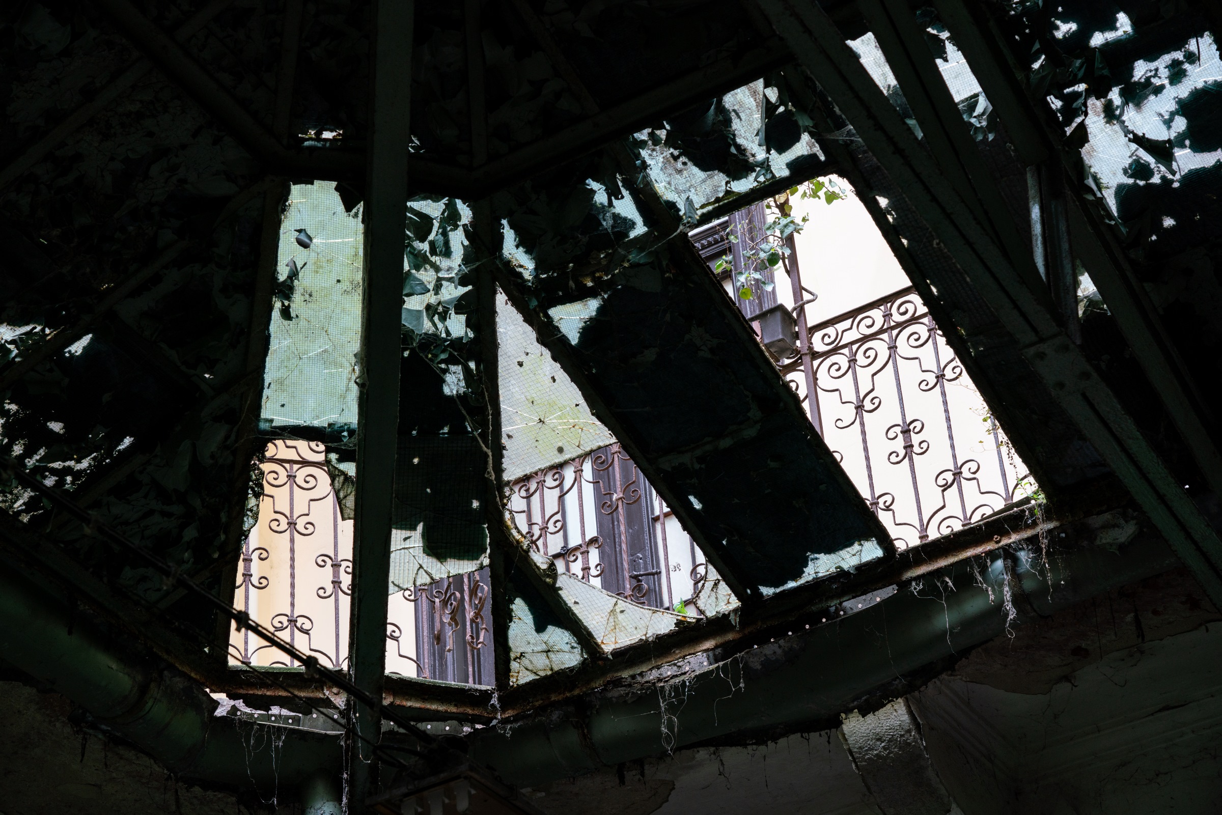 The abandoned courtyard of Paulay Ede utca 25-27 in Budapest. This residential building from 1890 is known as the "Üveg-Udvar" - "Glass Courtyard".