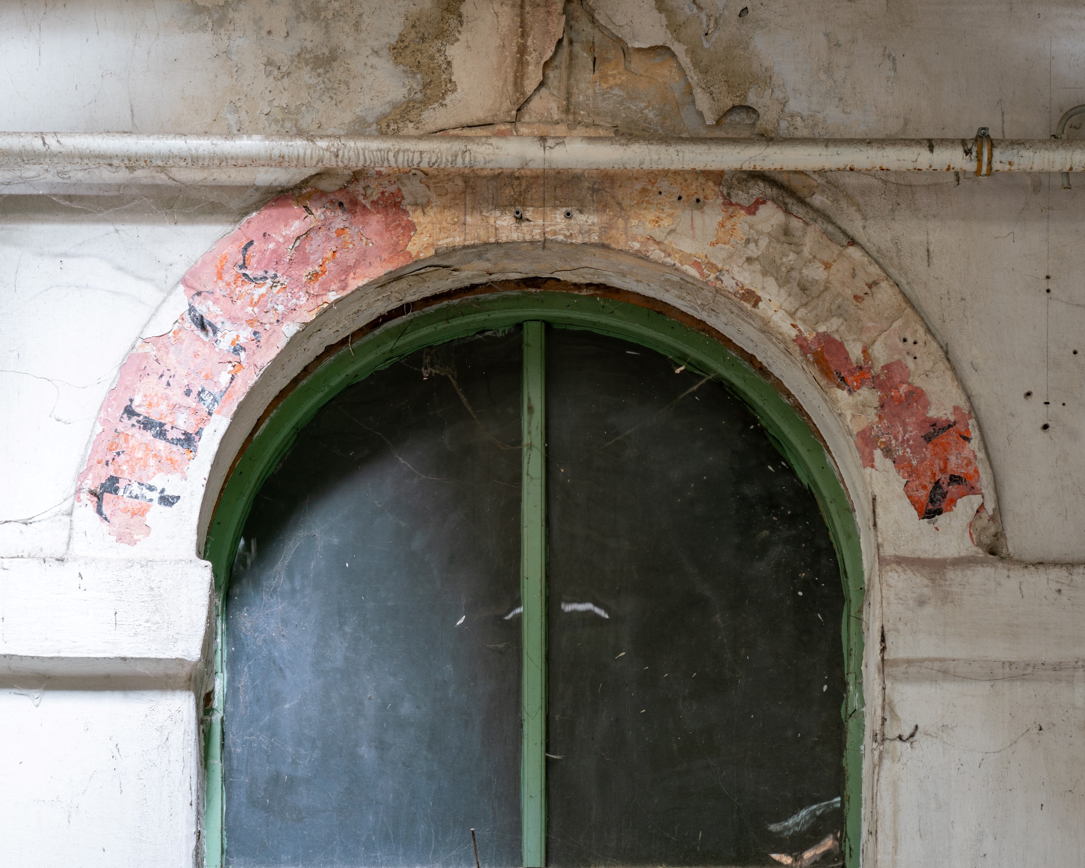The abandoned courtyard of Paulay Ede utca 25-27 in Budapest. This residential building from 1890 is known as the "Üveg-Udvar" - "Glass Courtyard".